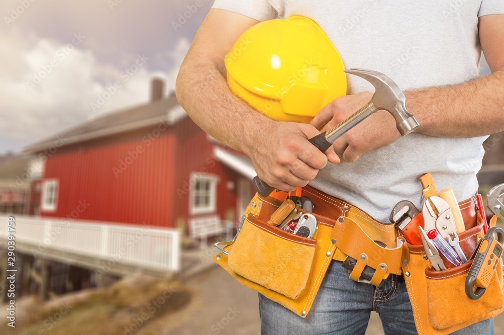 Worker with a tool belt. Isolated over background. Worker with a tool belt. Isolated over background.