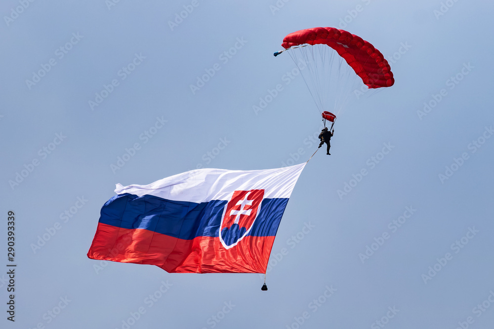 Slovakian national flag under the parachute Slovakian national flag under the parachute