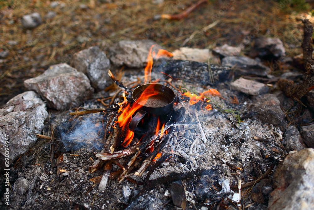 Bonfire coffee mug with smoke and fire on a picnic nature