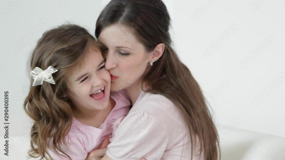 Caucasian girl running to mother