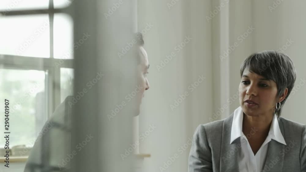 Business people talking in office Business people talking in office