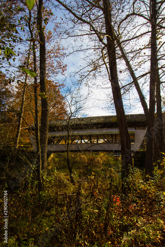 Mink Hollow Covered Bridge Over Arney Run in Autumn, Ohio photo