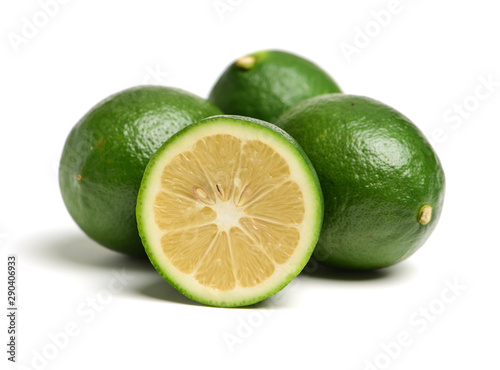 Fresh limes on white background