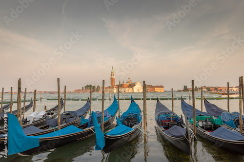 Iconic Venice gondolas and a warm sunset © Silvana