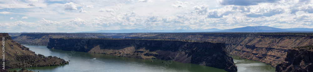 Beautiful Panoramic View of The Cove Palisades State Park during a cloudy and sunny summer day. Taken in Oregon, United States of America.