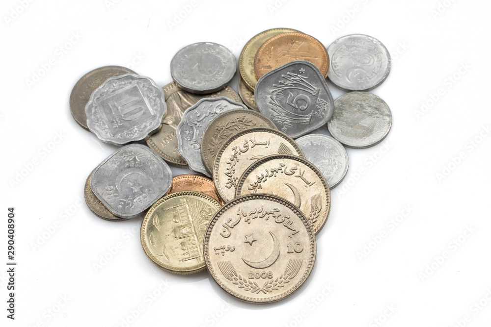 A close up, macro image of a pile of multicolored coins from Pakistan isolated on a clean, white background A close up, macro image of a pile of multicolored coins from Pakistan isolated on a clean, white background