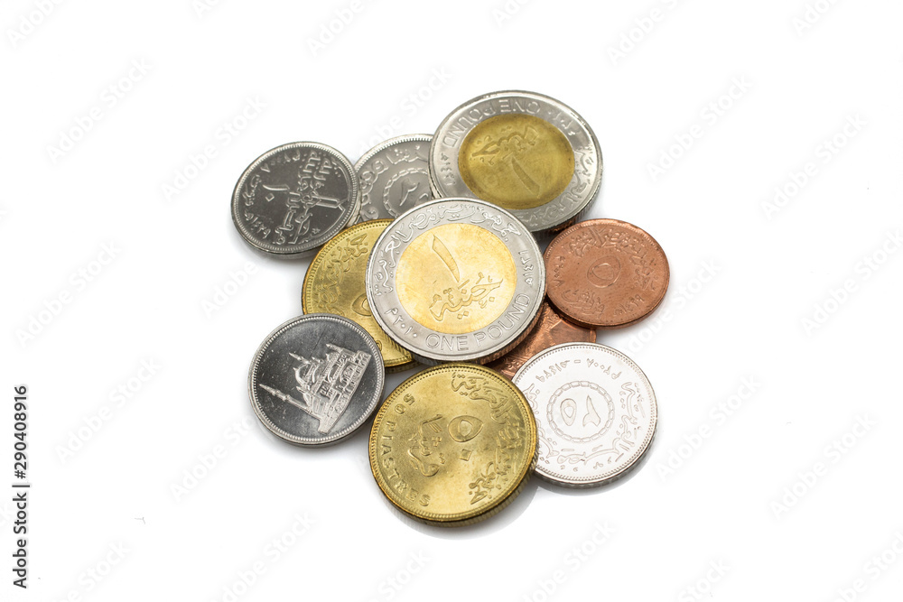 A close up image of an assorted, shiny collection of coins from Egypt.  Shot close up in macro.