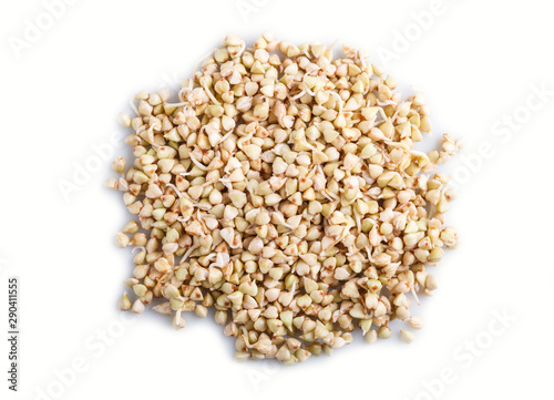 Heap of germinated buckwheat isolated on white background, top view.