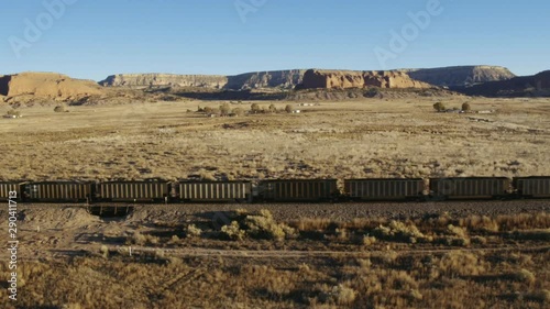 Aerial view of freight train in desert, Gallup, New Mexico, United States