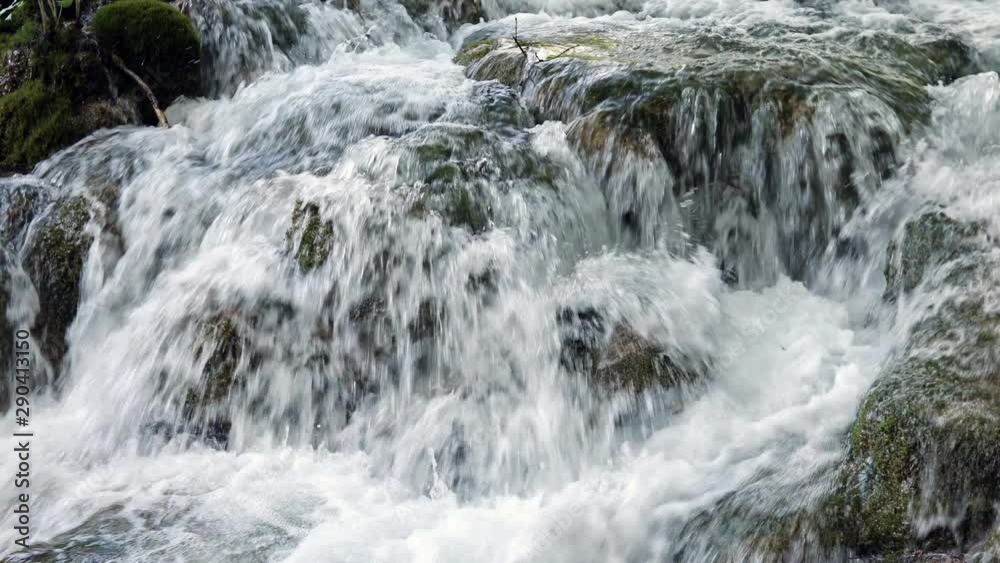 Close up of river flowing over rocks at Plitvice National Park in Croatia Close up of river flowing over rocks at Plitvice National Park in Croatia