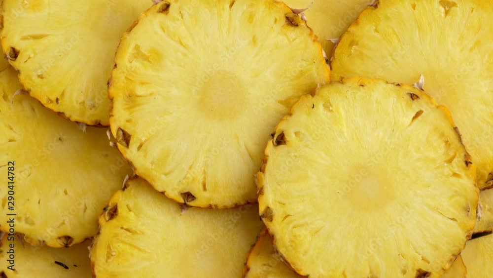 Sliced pieces of delicious pineapple fruit. Tropical food. Rotate Sliced pieces of delicious pineapple fruit. Tropical food. Rotate