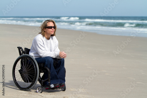 Woman in Wheelchair at the Beach Thinking