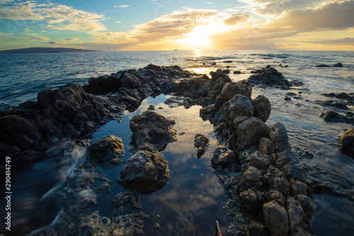 Sunset along a rocky south Maui coastline