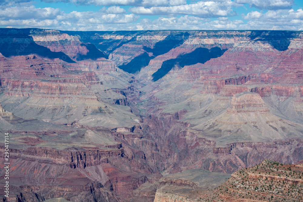 Wide view of the grand canyon at midday Wide view of the grand canyon at midday