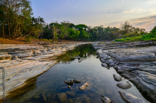 Little river located in Wanagama, Indonesia. With a forest surrounding it make a beautiful place to go