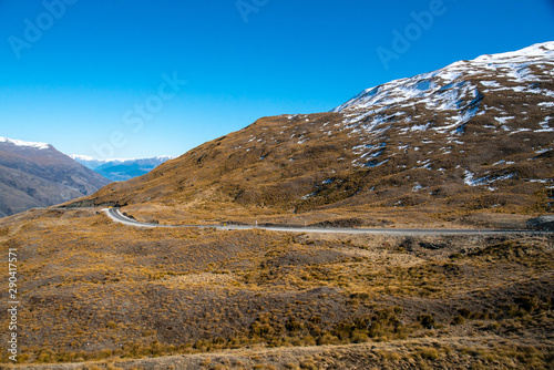 Alpine Pass road winding its way through the extreme terrain in New Zealand Southern alps