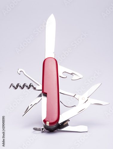 closeup of a swiss knife in white background
