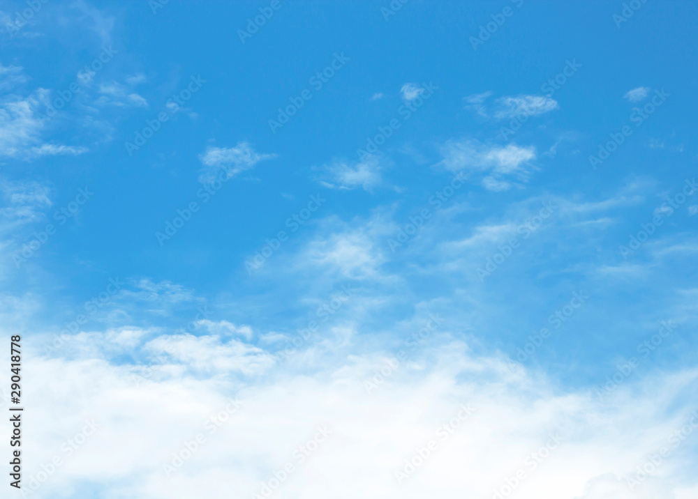 blue sky background with tiny clouds blue sky background with tiny clouds