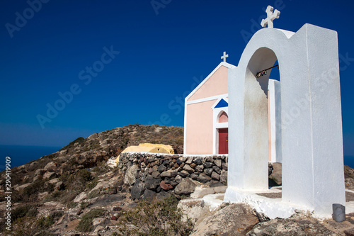 Beautiful small church next to the walking path between Fira and Oia in Santorini Island