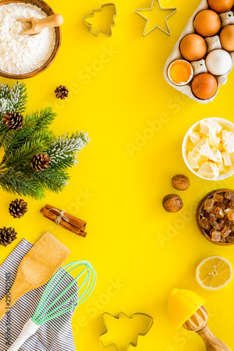 Baking frame. Ingredients and utensil on yellow background top view copy space