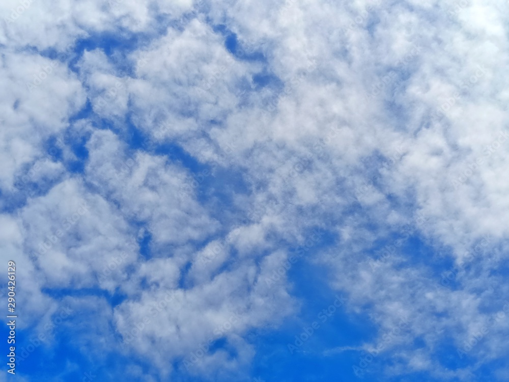 Air clouds in the blue sky, blue sky with clouds. Air clouds in the blue sky, blue sky with clouds.