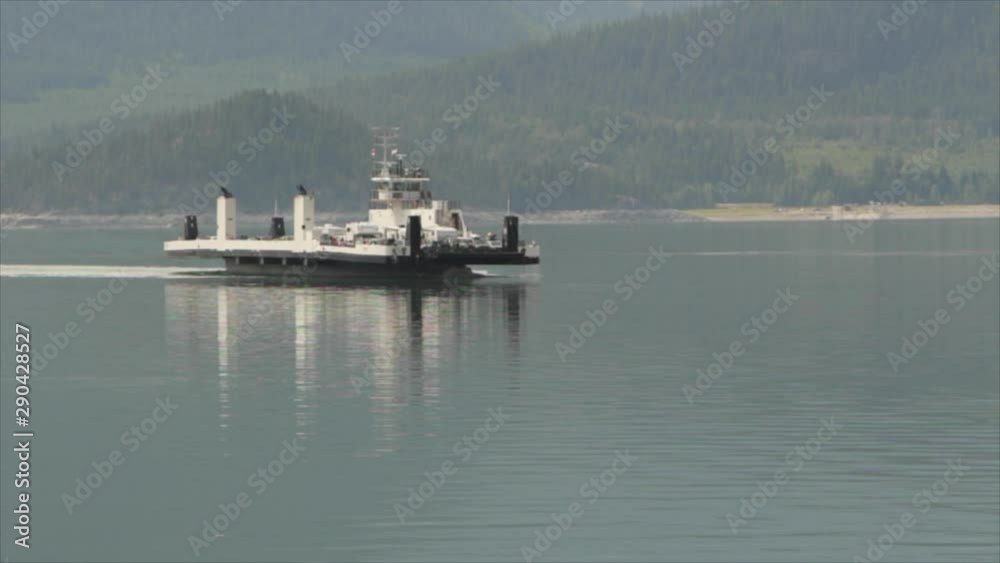 Automobile ferry crosses the lake in British Columbia, Canada. Automobile ferry crosses the lake in British Columbia, Canada.