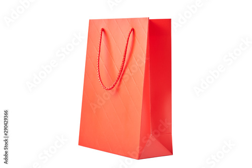 Red paper shopping bag isolated on a white background