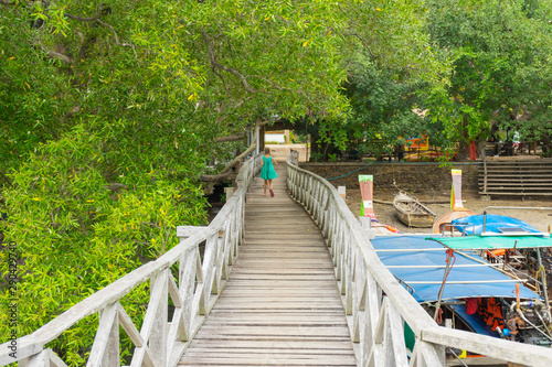 Wooden pier and green tree at Ao tha lane, Krabi, Thailand