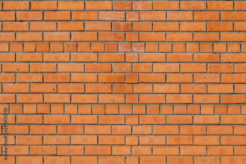 Background of brick red wall interior.