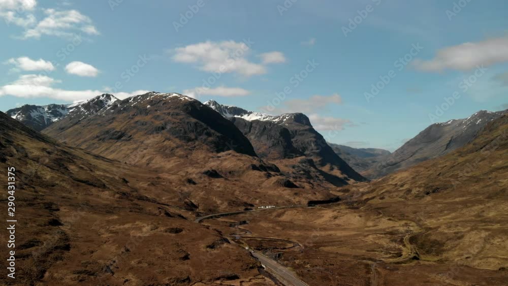 Drone shot of The Three Sisters Mountains in Glencoe, Scotland Drone shot of The Three Sisters Mountains in Glencoe, Scotland