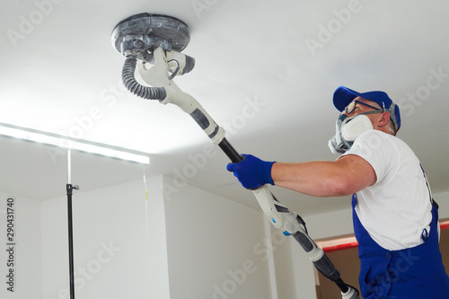 Картината върху платно Painter work with ceiling