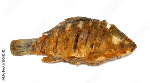 Fried fish on a plate, white background.