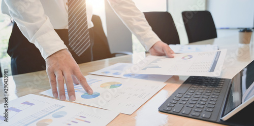 Cropped shot of young accountant preparing profit and loss statements for his client