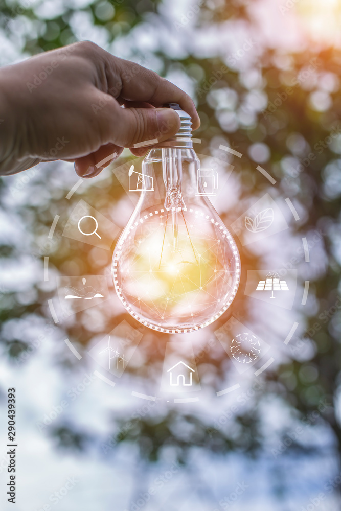hand holding light bulb against nature, icons hand holding light bulb against nature, icons