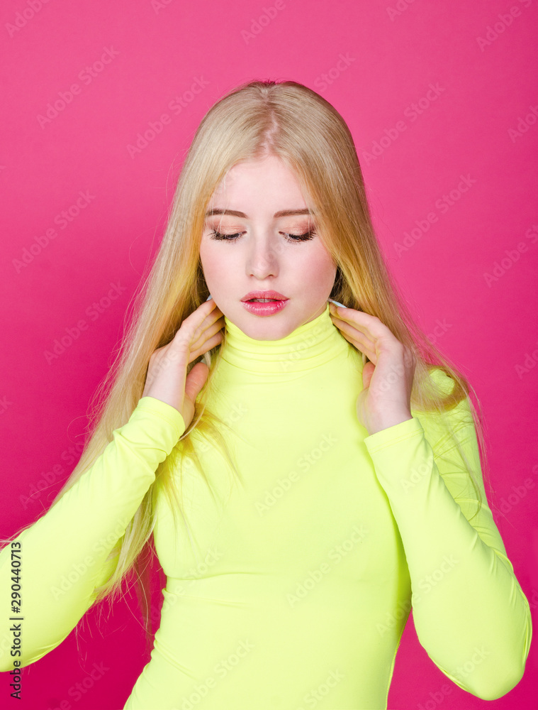 Portrait of fashion blonde model girl young woman wearing stylish isolated on a pink Portrait of fashion blonde model girl young woman wearing stylish isolated on a pink