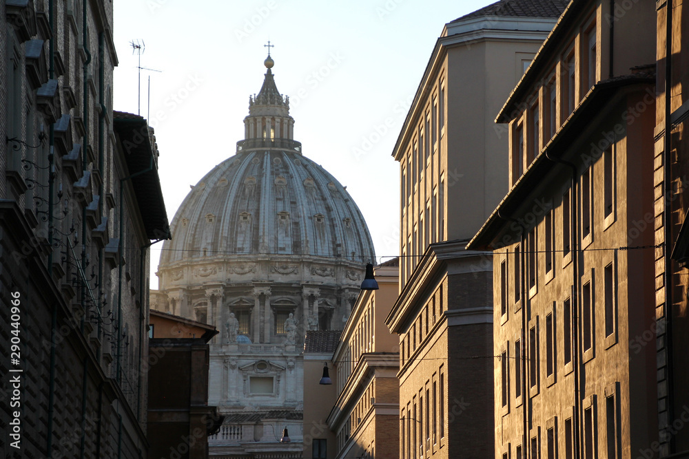 View of the St. Peter's Basilica of Rome from a street
