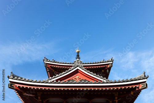 Japan style tile roof with blue sky.