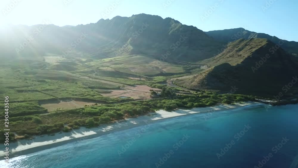Drone Shot showing the beautiful Makua Valley and Makua Beach at sunrise on Oahu, Hawaii. Drone Shot showing the beautiful Makua Valley and Makua Beach at sunrise on Oahu, Hawaii.