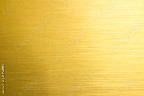 Gold metal backgrounds or metal texture seamless pattern luxury shiny gold. Light realistic, shiny, metallic empty golden gradient template. Abstract metal decoration. Design for wall.