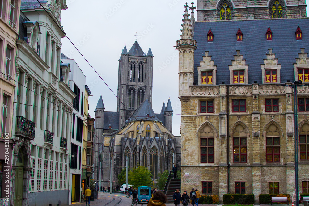 Obraz premium Saint Nicholas' Church (Sint-Niklaaskerk) with the Belfry (Het Belfort) at the foreground in Ghent, Belgium, Europe