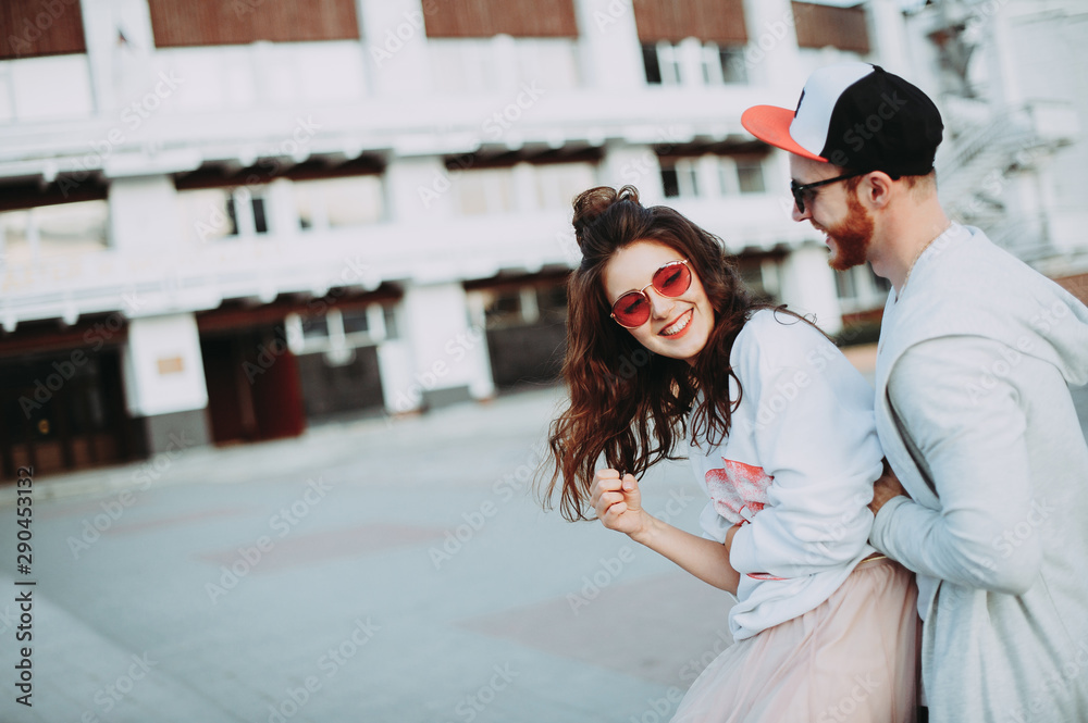 Fototapeta premium young modern stylish couple urban city outdoors