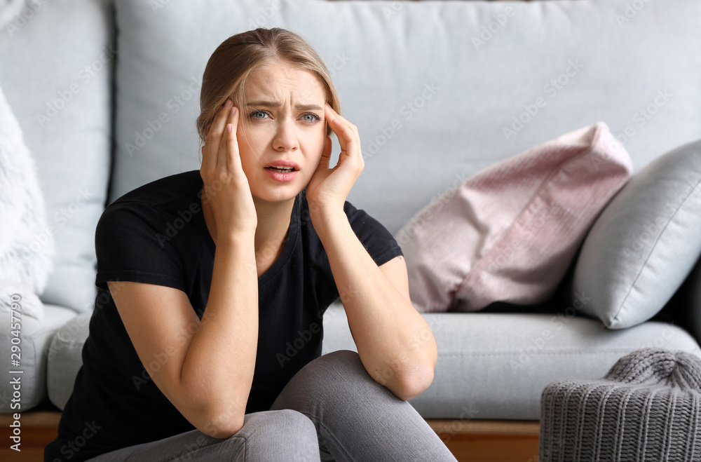 Woman having panic attack at home Woman having panic attack at home