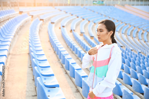 Sporty Asian woman at the s...