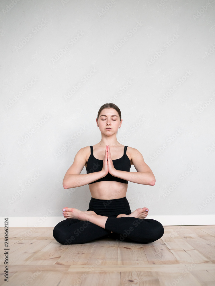 Attractive european girl doing yoga exercise Attractive european girl doing yoga exercise