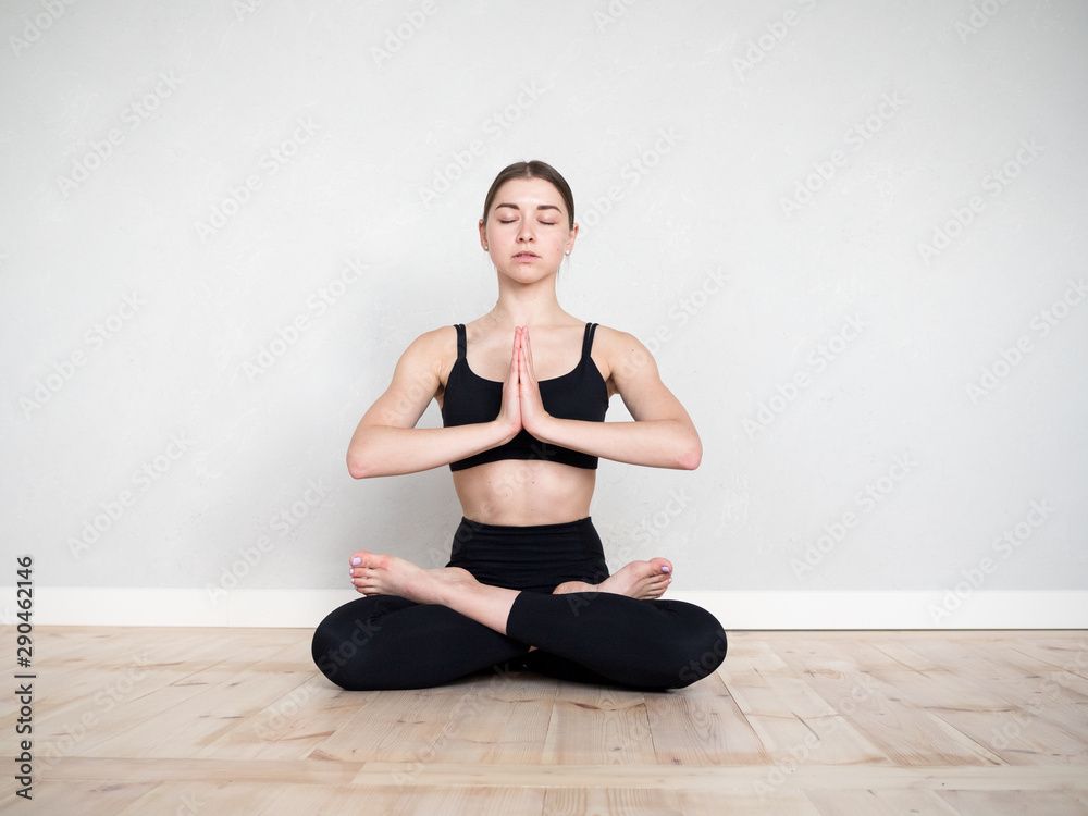 Attractive european girl doing yoga exercise Attractive european girl doing yoga exercise