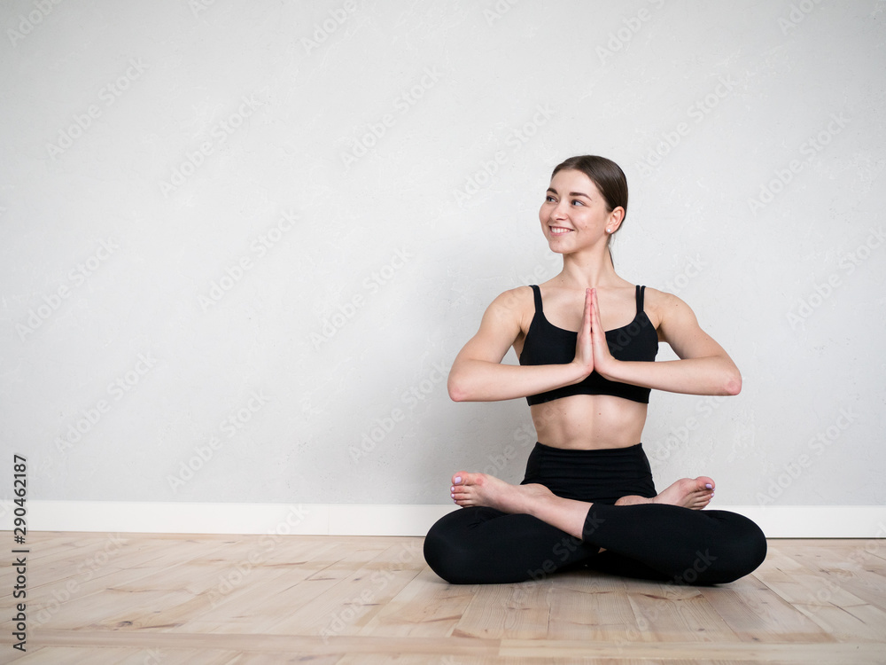Attractive european girl doing yoga exercise Attractive european girl doing yoga exercise