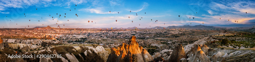 Balloons in the sky over Valley of Love in Cappadocia photo