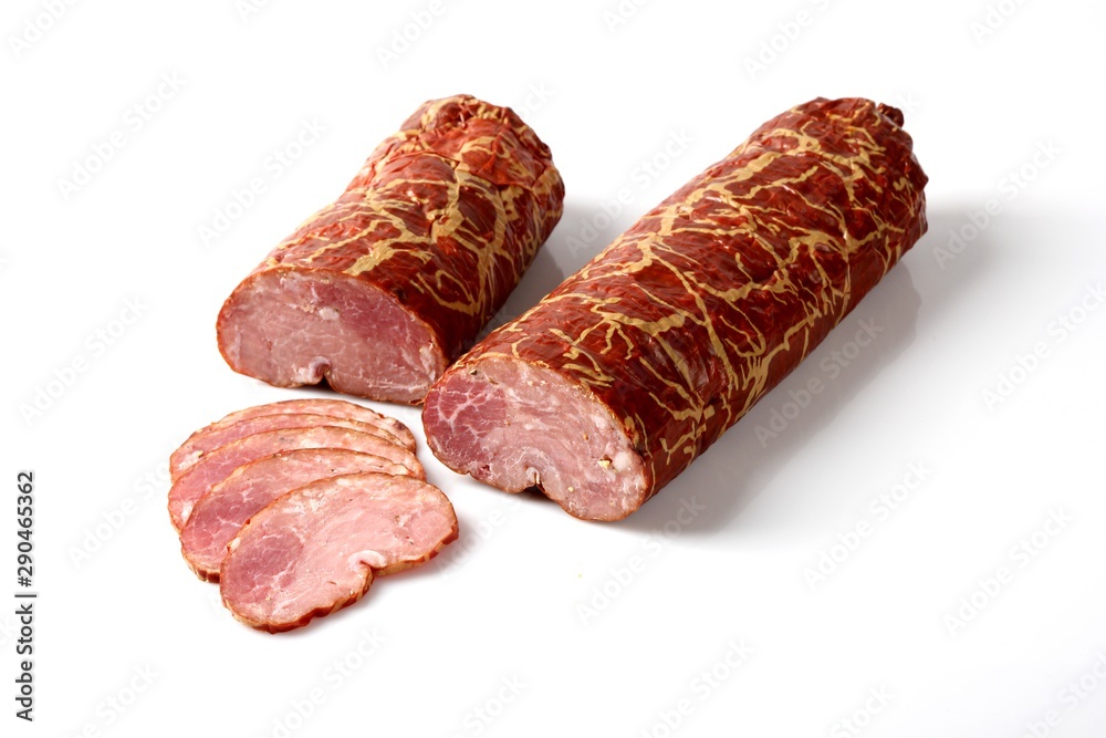 Dried beef sausage. Traditional sausage on a white background.