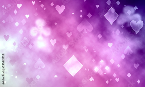 Purple pattern of playing cards symbols.
