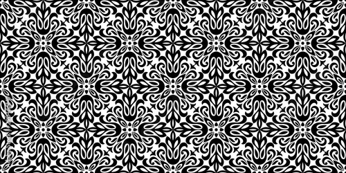 Wallpaper in the style of Baroque. Seamless vector background. White and black floral ornament. Graphic pattern for fabric, wallpaper, packaging. Ornate Damask flower ornament
